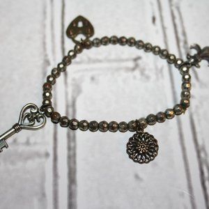 Beautiful silver rustic charm bracelet 7"